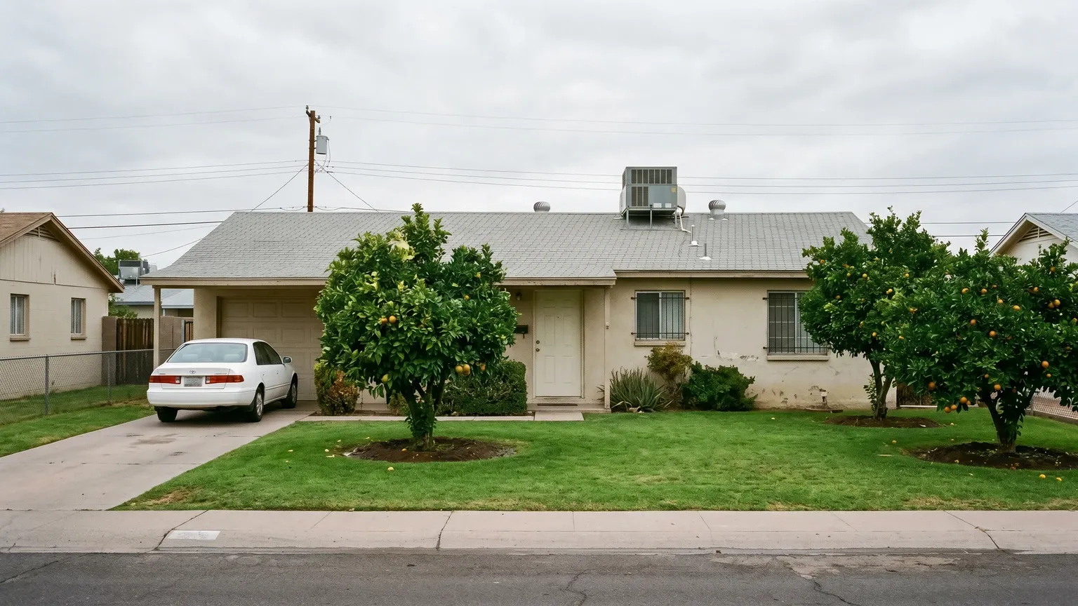 A rooftop evaporative swamp cooler on an older Glendale Arizona ranch home, a common source of added indoor humidity that raises mold risk.